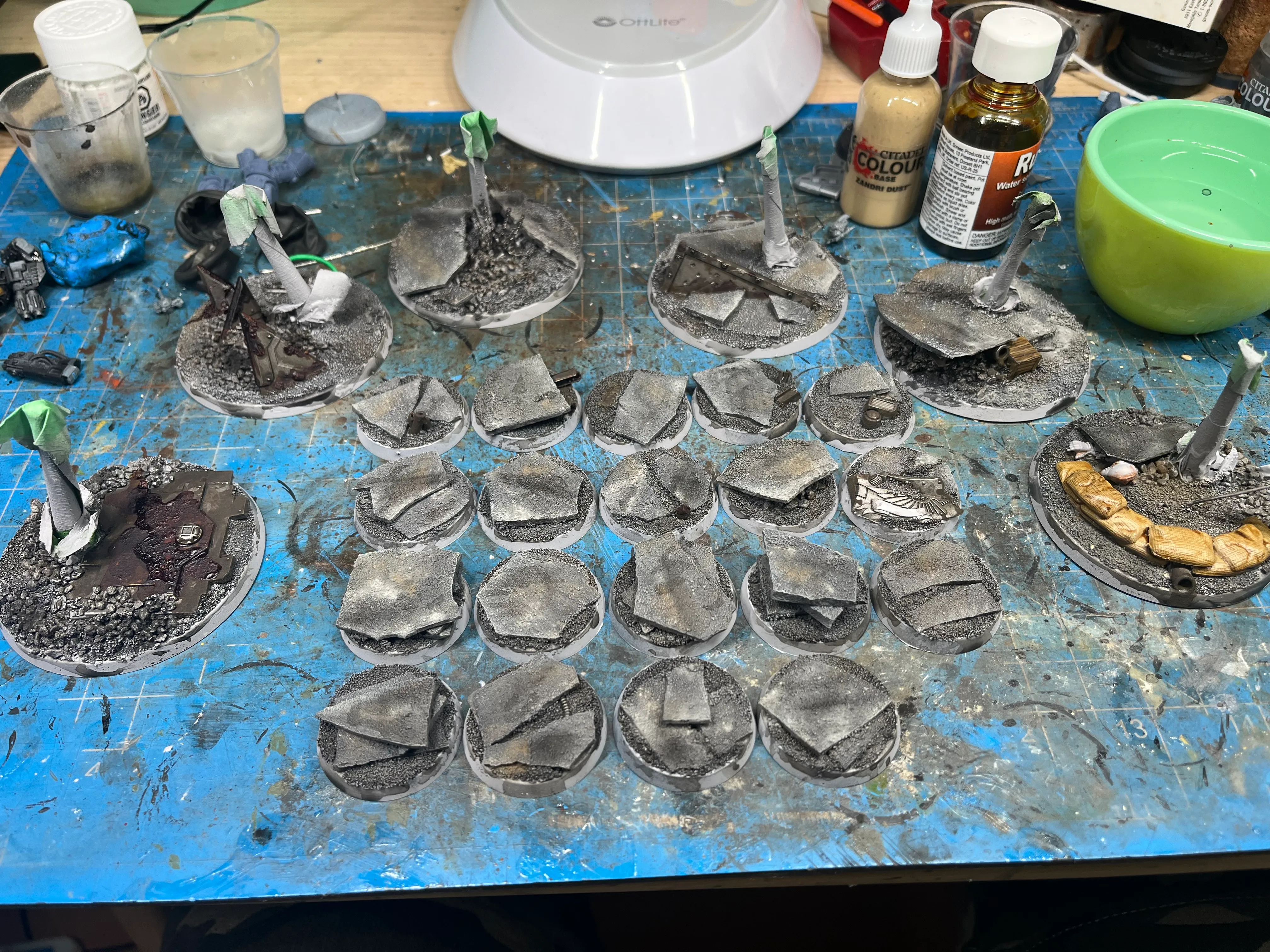 Finished ruined city bases with dry pigment weathering